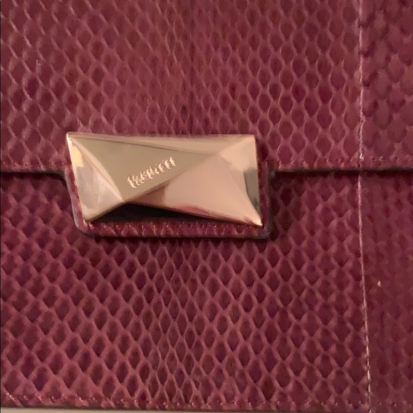 Cesare Paciotti burgundy lizard leather clutch. - Picture 2 of 6